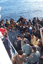 Boat People at Sicily in the Mediterranean Sea